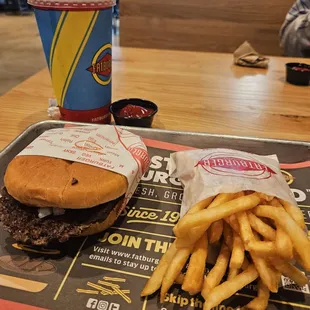 First combo meal  Burger, skinny fries and medium drink