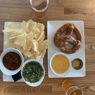 Spinach dip (served with chips and salsa) $11, pretzel (served with melted cheese and spicy mustard)