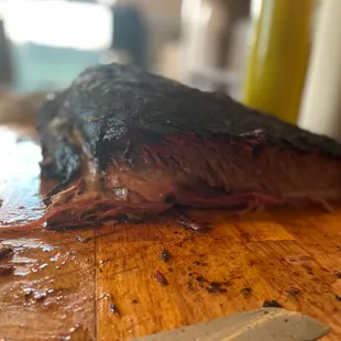 a piece of meat on a cutting board