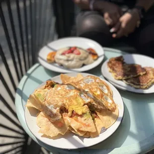 three plates of food on a table