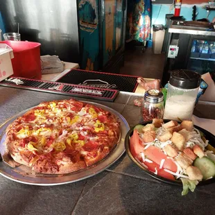 Pepperoni, banana pepper, onion pizza, house garden salad