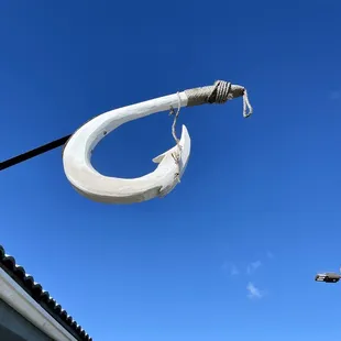 a fish hook hanging from a pole