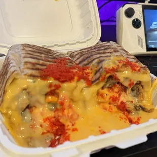 Triple threat burrito with hot Cheetos and nacho cheese