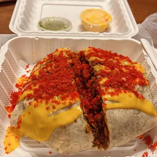 Birria Crunch Wrap with added Cheetos and cheese.  Soooooo good!