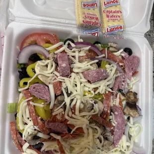 Antipasto salad, decent except I have never ordered a dinner salad from an Italian restaurant that came with crackers instead of bread..