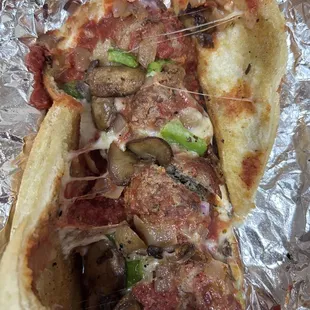 Meatball.  Ord. w/ light sauce &amp; pd $3 extra to add grilled onions, mushrooms &amp; peppers to it. Heavy on sauce,light on adds,not fresh bread