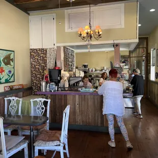 Entering the local, you place your order and take any available table.
