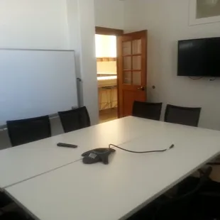 Conference room is part of the rent, just sign up for this time