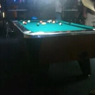a man playing pool