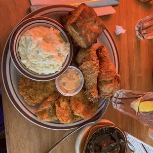 Fried chicken, fried green tomatoes, greens, grits and biscuits