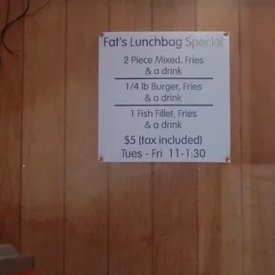 a sign on the wall of a restaurant