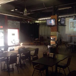 an empty restaurant with tables and chairs
