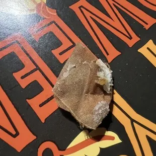 bandaid baked in pizza dough.