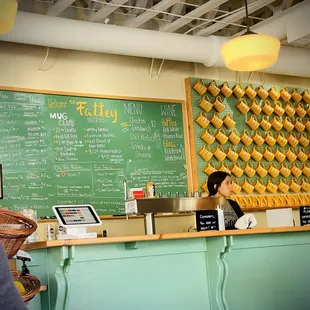 a woman behind the counter