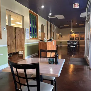 a table and chairs in a restaurant