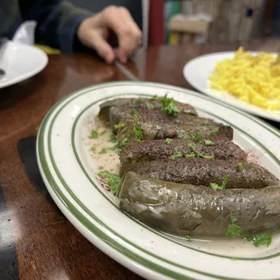 Fantastic grape leaves served warm and dusted with sumac