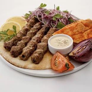 Beef kebab and also has chicken kebab scum of the salads bread and sauce