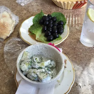 Cucumber yogurt dill salad..black olives and pita bread..