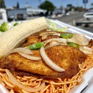 a meal in a styrofoam container