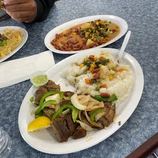 Corn grits (soor) with sakuma and goat meat