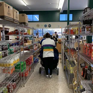 One cashier- but it moves quick and this is the only true aisle in the shop