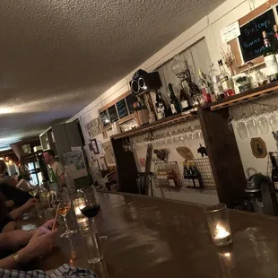 people sitting at a bar
