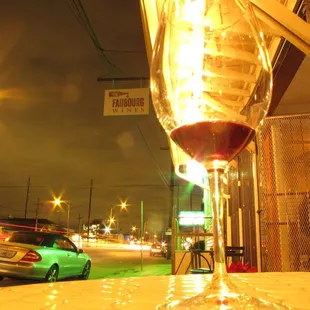 a glass of wine on a table