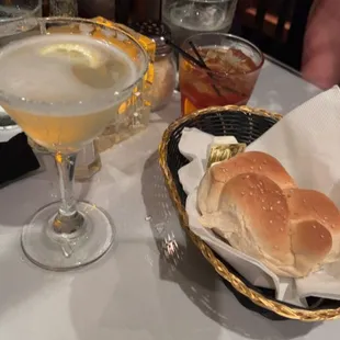 Lemon drop martini, an old fashion, and the knotted bread