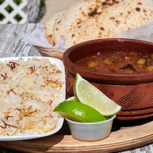 Tagen Okra with Lamb served with Egyptian bread and Egyptian rice.