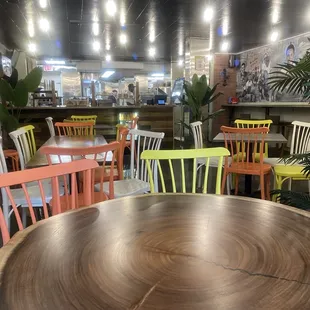 a table and chairs in a restaurant