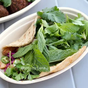 Spicy Chicken Flatbread Sandwich ($15.00) - it's good! I really like the chicken and the yogurt. Not spicy though.