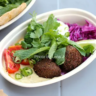Plate with Falafel ($18.00) -subbed hummus for tabbouleh. Good and fresh but it didn't feel worth the price; I preferred the chicken.