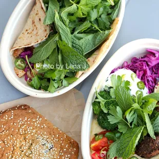 Spicy Chicken Flatbread Sandwich ($15.00), Plate with Falafel ($18.00), Tahini Chocolate Chip Cookie ($4.00)