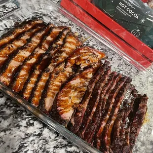 Sliced brisket drizzled in goodness