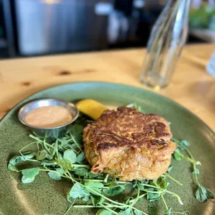 Lions main, remoulade, lemon, local greens