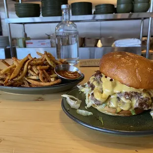 Burger and fries with Cajun sauce