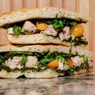 Marinated Tuna Sandwich
Genovese Pesto, Arugula, Datterino Tomatoes, Focaccia