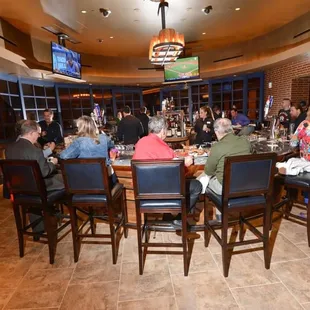 Grab a drink at our circle bar at Favorites Steak &amp; Pasta