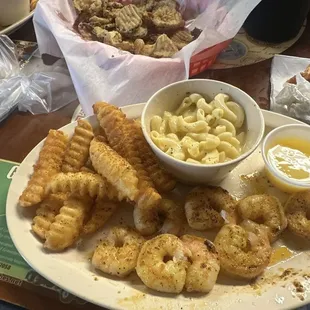 Grilled shrimp and crinkle fries with mac and cheese