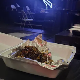 its the loaded brisket taco sorry about how the food looks a little but i ate some before the picture.