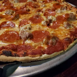 a pepperoni and sausage pizza