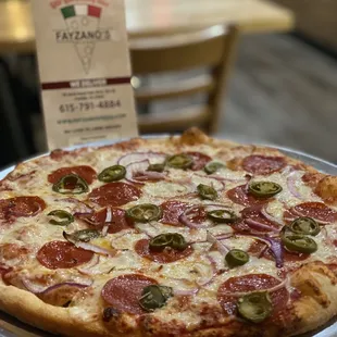 a pepperoni and jalapeno pizza