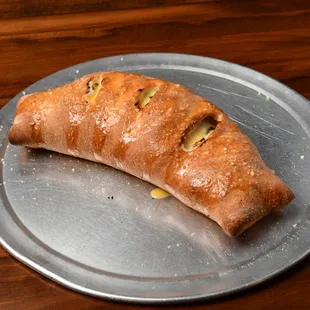 Cheese Calzone. Served with Marinara on a Side.