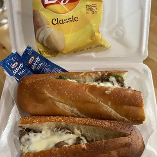 12&quot; Cheese Steak Sub serves with Lays chips.