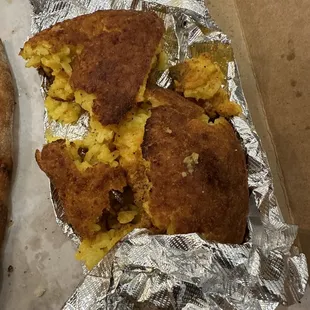 a half eaten pizza and a half eaten pizza