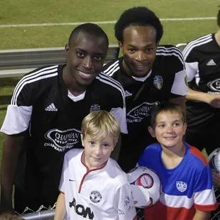 Our kids caught small soccer balls thrown into the crowd at the breaks and the players signed them afterward.