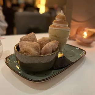 Dessert, beignets, and a banana pudding.