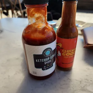 House ketchup and hot sauce!