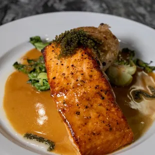 Pan Seared Salmon
with sticky rice cake, baby bok choy, marinated sea grapes, and miso butter sauce