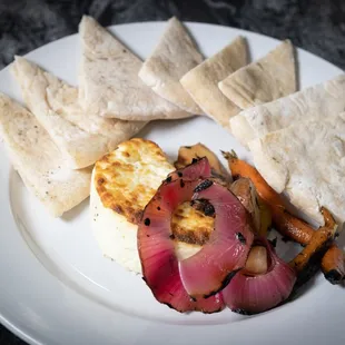 Baked Ricotta
with pickled spring vegetables, and house-made pita
